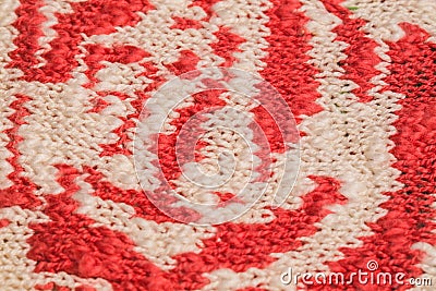 Macro color image of red and white knitted texture. Stock Photo