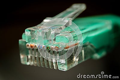 Macro cross section front angle view of RJ45 CAT6 shielded network data internet cable clear connector Stock Photo