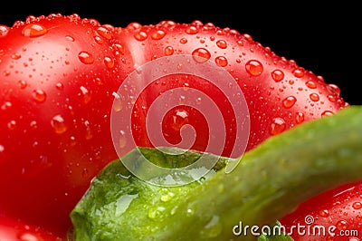 Macro cut shot of red bell pepper background with water drops Stock Photo