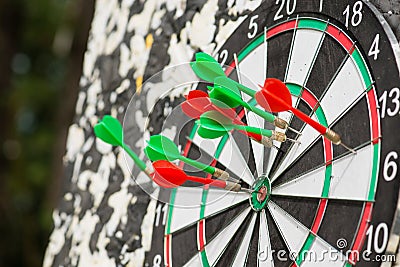 Macro darts in the center of the target, shallow DOF Stock Photo