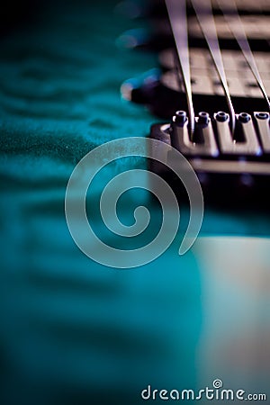 Macro Electric Guitar Strings & Metallic Paint Stock Photo