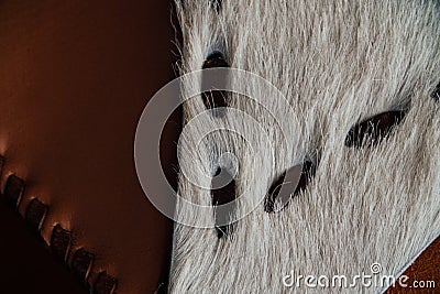 Macro fragment of a leather bag or purse. Handmade, texture background. Stock Photo