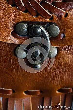 Macro fragment of a leather bag or purse. Handmade, texture background. Stock Photo