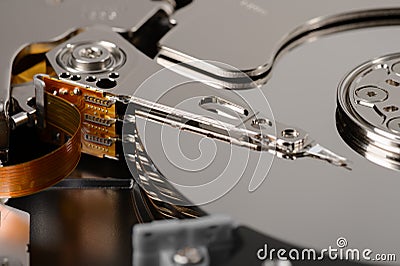 Macro hard drive. HDD. Outdated technology, computer memory, and unreliable storage media Stock Photo