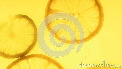 Macro image of backlit orange slice silhouettes Stock Photo