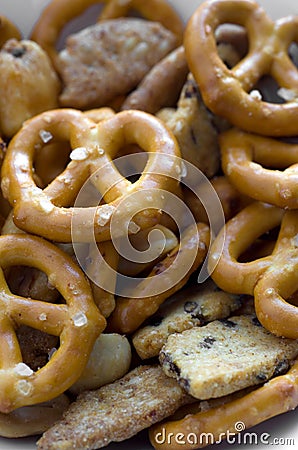 Macro Image of Delicious Mini Pretzels and Mixed Nuts Stock Photo