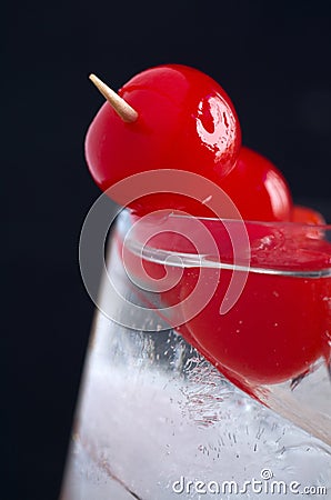 Macro Image Delicious Red Cocktail Cherries in a Glass with Ice Stock Photo