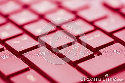 Macro keys of keyboard with wine color toning, angle view, soft background with copy space Stock Photo