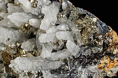 Macro mineral stone Galena, Sphalerite, Pyrite, Quartz on a black background Stock Photo