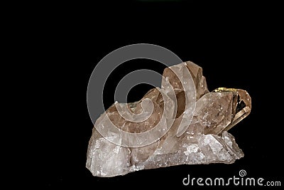 Macro mineral stone smoky quartz, rauchtopaz on a black background Stock Photo