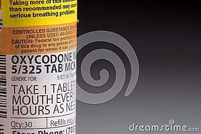 Macro of oxycodone opioid tablet bottle Stock Photo