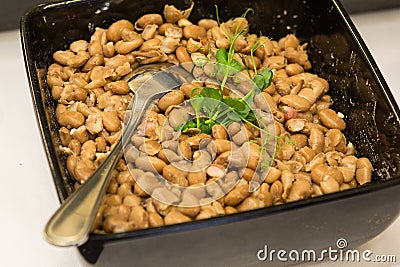 Macro photo of the bean salad in the bowl with spoon Stock Photo