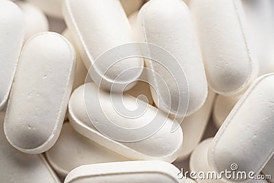 Macro photo of a bunch of little white zinc pills Stock Photo