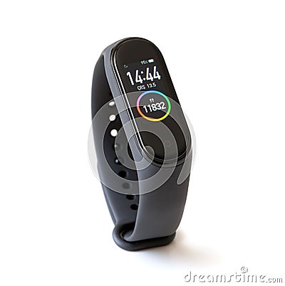 Macro photo of digital fitness tracker smart band with touch screen isolated on white background Editorial Stock Photo