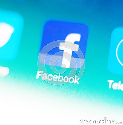 Macro photo from facebook sign and search bar on Mobile Phone Editorial Stock Photo