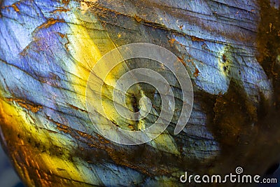 Macro photo of a iridescent crystal labradorite rock. Stock Photo