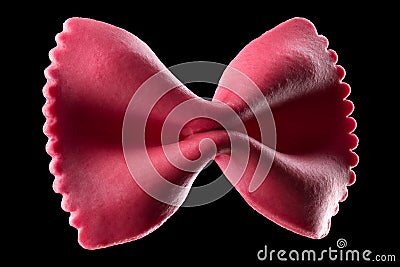 Macro photo of pink farfalle pasta isolated on black with clipping path Stock Photo