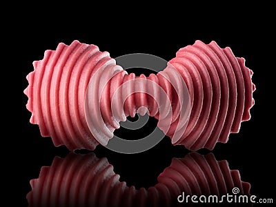 Macro photo of pink farfalle pasta isolated on black with clipping path Stock Photo