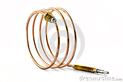 Macro photo of a temperature probe made of copper in the shape of a spiral with threaded tips, isolated on a white background. Stock Photo