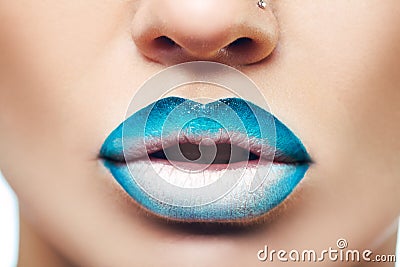 Macro photo of womans lips with lipstick Stock Photo