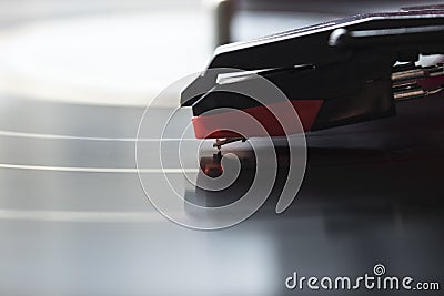 Macro photograhpy to a red turntable needle and LP vinyl Stock Photo