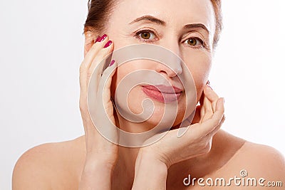 Macro Portrait Elderly Woman Face Isolated. Spa and Skin Care. Collagen and Plastic Surgery. Anti aging and Body Care Concept. Stock Photo