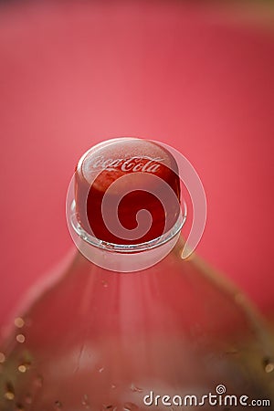 Macro shallow depth of field image selective focus with the plastic bottle cap of a Coca Cola bottle Editorial Stock Photo