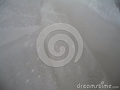 Openwork transparent fabric background beige Stock Photo