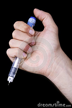 Holding a Penicillin Syringe Stock Photo