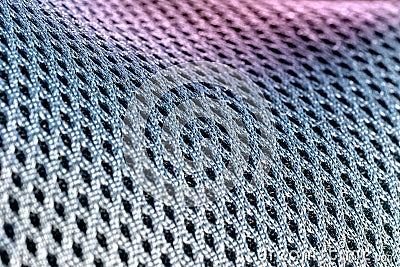 Macro shot of a mesh-like undulating gray-silvery purple surface Stock Photo