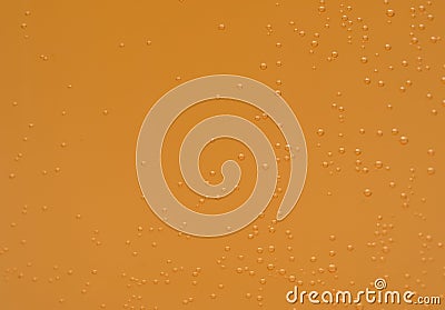 Macro shot of orange effervescent bubbles of calcium and vitamin Stock Photo