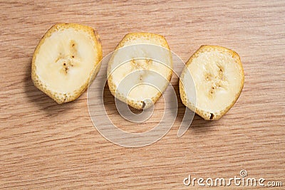 Macro shot of three banana slices Stock Photo