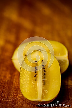 Macro sliced yellow kiwi fruit Stock Photo