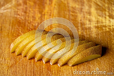 Macro sliced yellow kiwi fruit Stock Photo