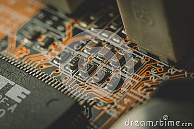 Macro snapshot of an old pcb computer. Letters and numbers. Stock Photo