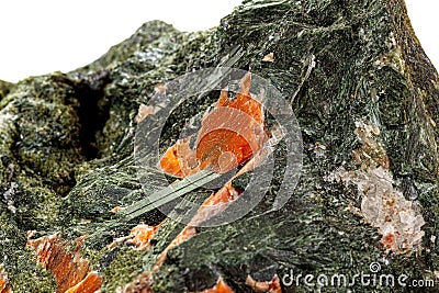 Macro stone mineral Diopside Calcite Magnetite on a white background Stock Photo