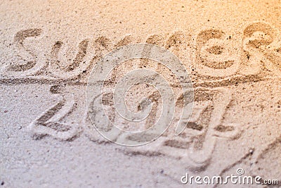 Macro Summer inscription on the sand at the beach Stock Photo