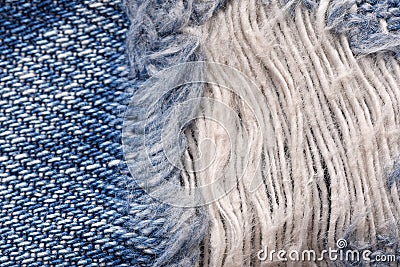 Macro of torn jeans, Denim texture pattern, Close up of ripped threads Stock Photo