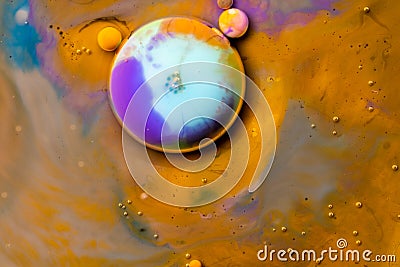 Macro universe, platnets and stars in it, multi-colored paints Stock Photo