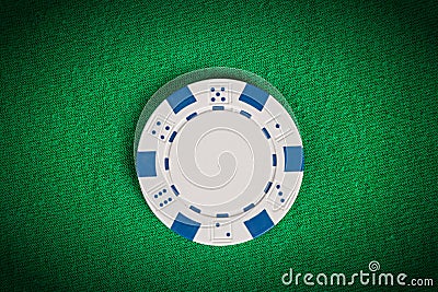 Macro white poker chip on green table Stock Photo