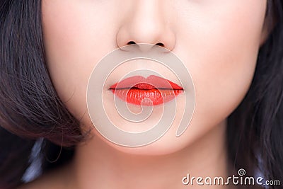 Macro of woman`s face part. Red lips makeup. Stock Photo