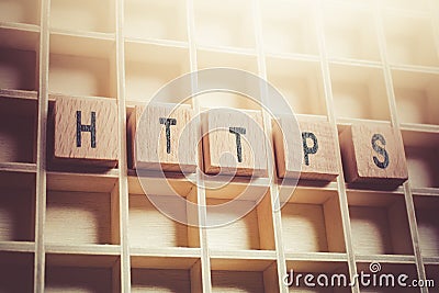 Macro Of The Word HTTPS Formed By Wooden Blocks In A Typecase Stock Photo