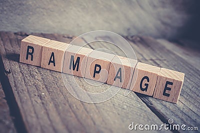 Macro Of The Word Rampage Formed By Wooden Blocks On A Wooden Floor Stock Photo