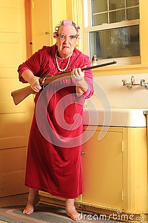 Mad Granny with Rifle Stock Photo