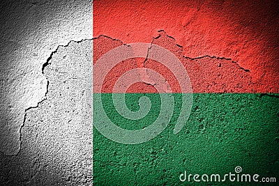 Madagascar flag on cracked wall Stock Photo