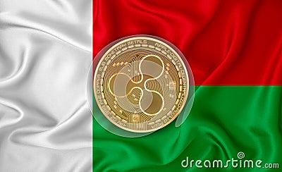 Madagascar flag, ripple gold coin on flag background. The concept of blockchain, bitcoin, currency decentralization in the country Editorial Stock Photo