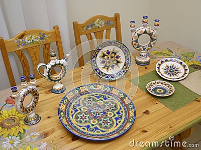 Made in Ukrainian traditional style painted crockery placed on a table. Kyiv, Ukraine Editorial Stock Photo