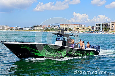 Madeira Beach, Florida, U.S - September 30, 2019 - A group of people cruising on a boat Editorial Stock Photo