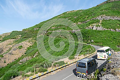 Madeira holiday summer trip vacation tourism mountains sunny day green trees landscape tourist busses Editorial Stock Photo