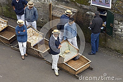 Madeiran Toboggan drivers waiting for customers Editorial Stock Photo